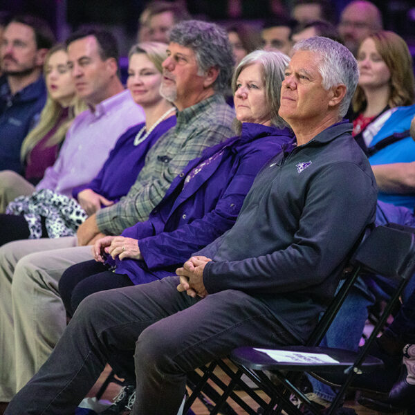 Doug and Angie Robison listen during Homecoming Chapel on Saturday, Oct. 13, 2018. Next to them are Doug's brother, Dan, and his wife, Pam. The Robison family are members of the Robison Excelsior Foundation, which has pledged $3.2 million to ACU's NEXT Lab.
