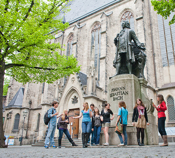 Students taking pictures of the Johann Sebastian Bach statue