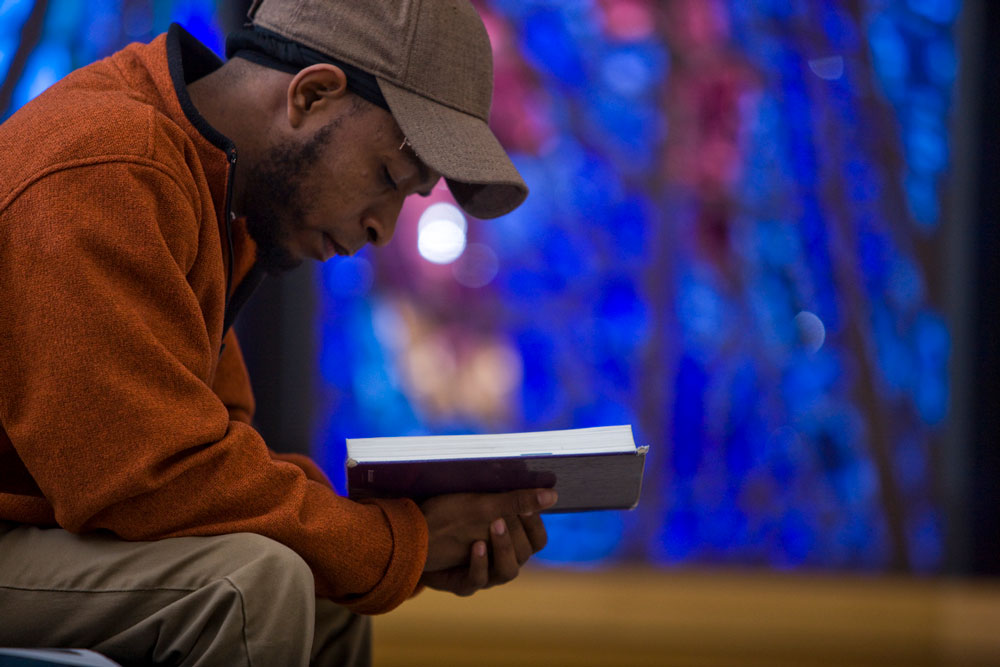 M. Div Student reading Bible