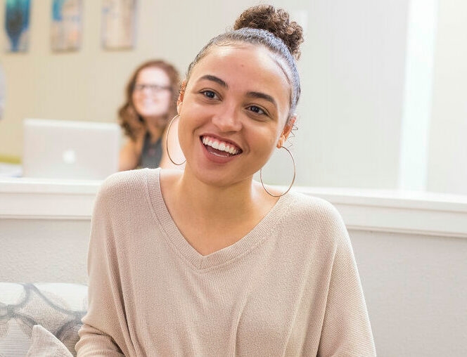 A biblical studies student smiling