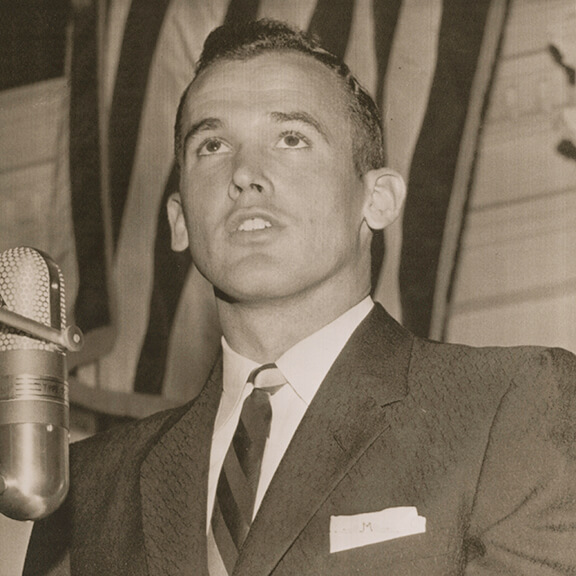A black and white headshot of Bobby Morrow