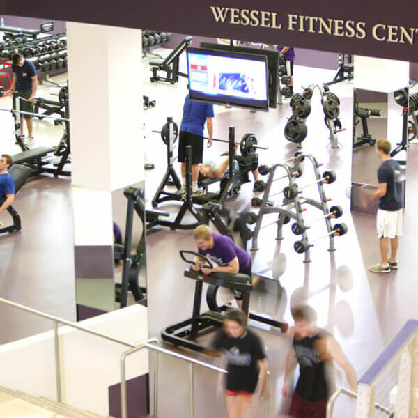 Students in the ACU fitness center.