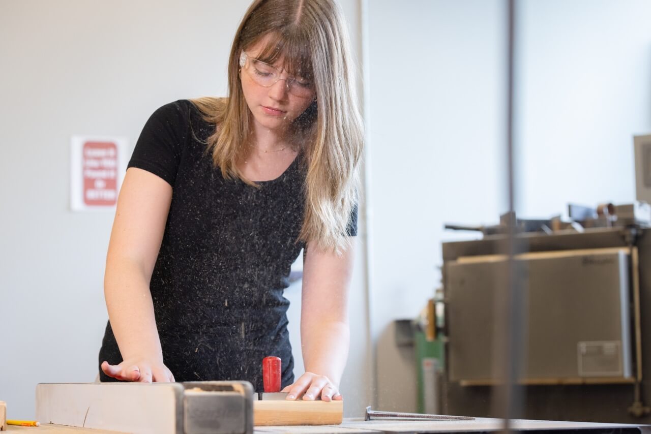 Engineering Student in a woodshop