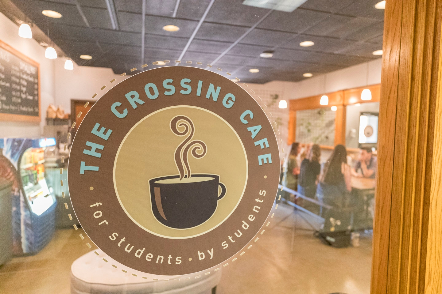 The Crossing Cafe sign
