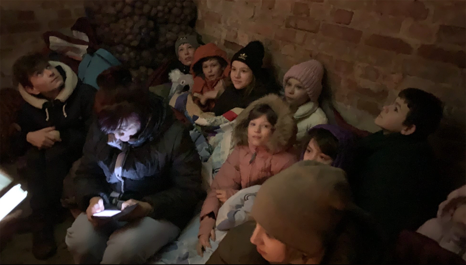 This photo sent to the Kellys by Jeremiah’s Hope administrator Xander Petrov shows the children sheltering in the unheated root cellar of a farmhouse in Ukraine.