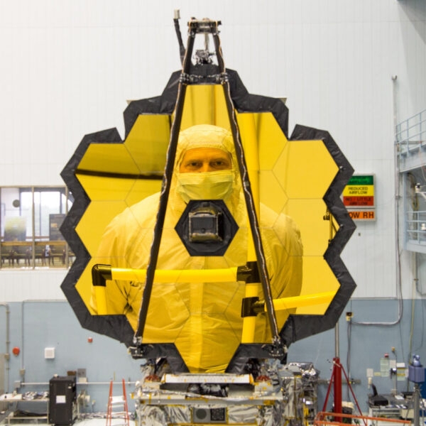 scott acton is reflected in the primary mirror of the James Webb Space Telescope