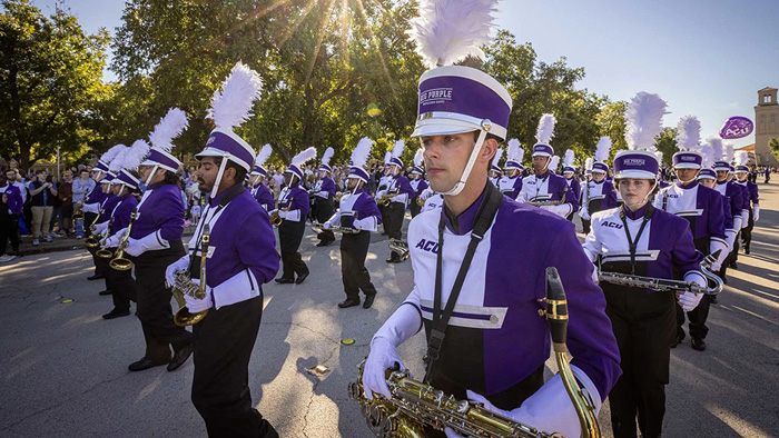 Big Purple Marching Band in Homecoming parade