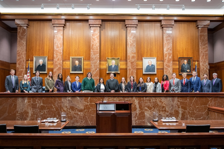 Students and faculty in the Texas Supreme Court.