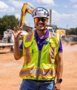 Engineering student on baseball field site
