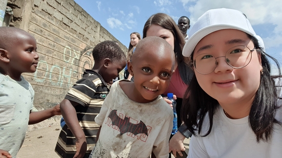 Cho with kids from CMF International this summer.