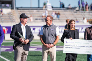 Dr. Schubert at the check presentation from Cenergistic.