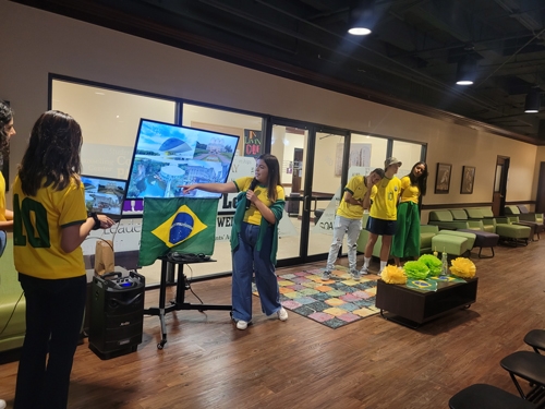 Students highlighting their home country, Brazil, during last years' Culture Week. 