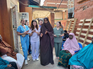 Nutrition students provide instruction to Somalian refugees in Uganda. 