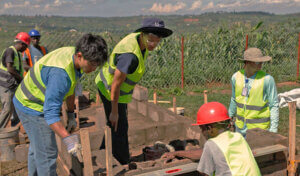 Engineering students complete a land survey for Rwanda Children.