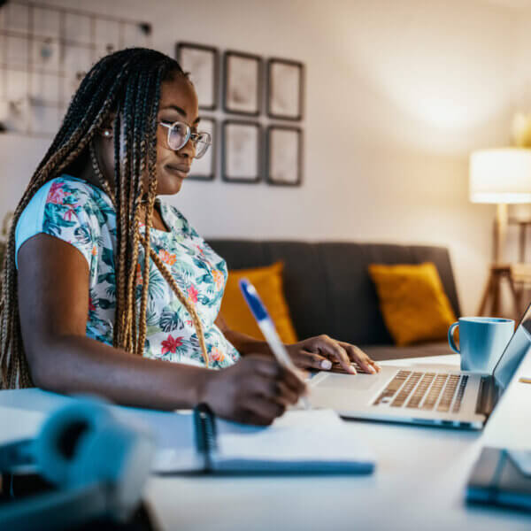 African American female student studying from home during lockdown