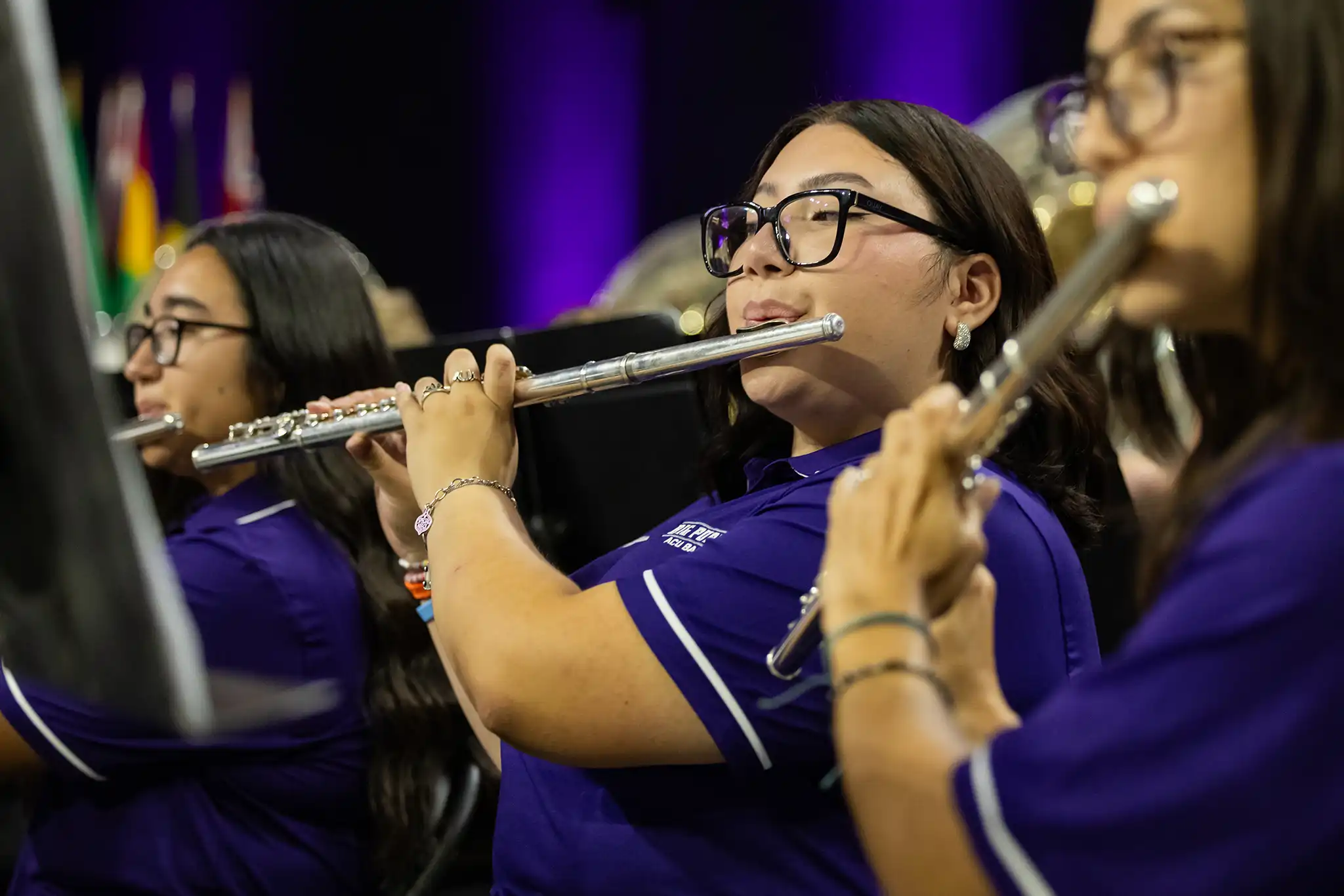 Flute section in Big Purple Marching Band plays a song.