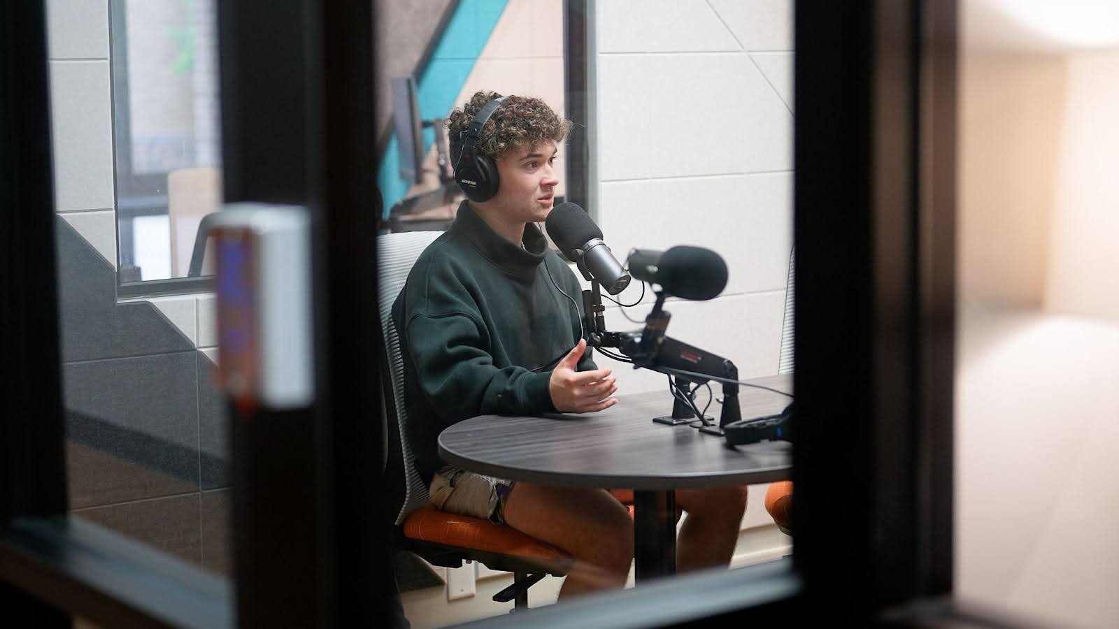 student using podcast studio.