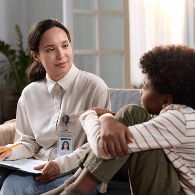 Therapist Talking to Young Boy