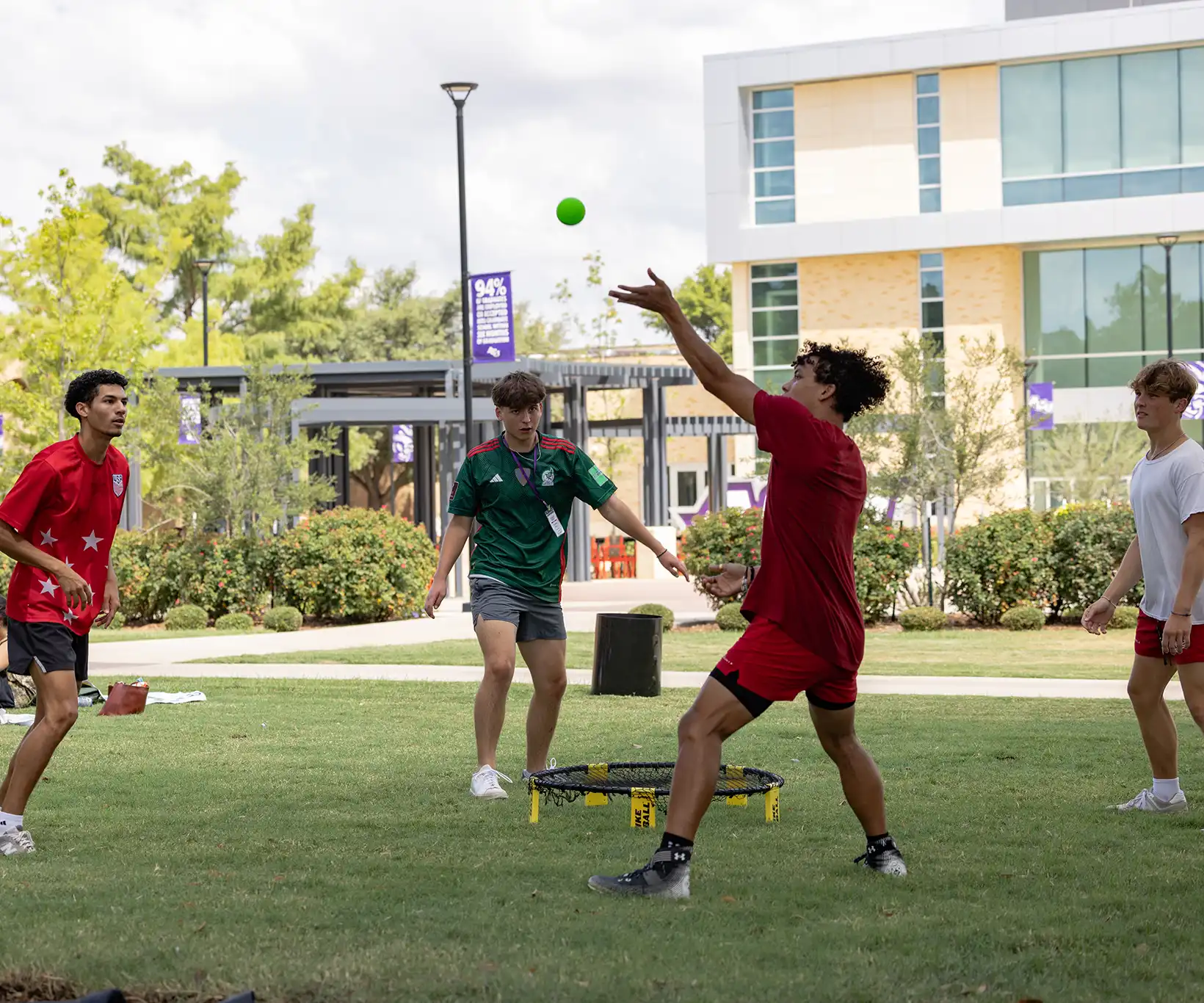 ACU students are focused during a point of roundnet.