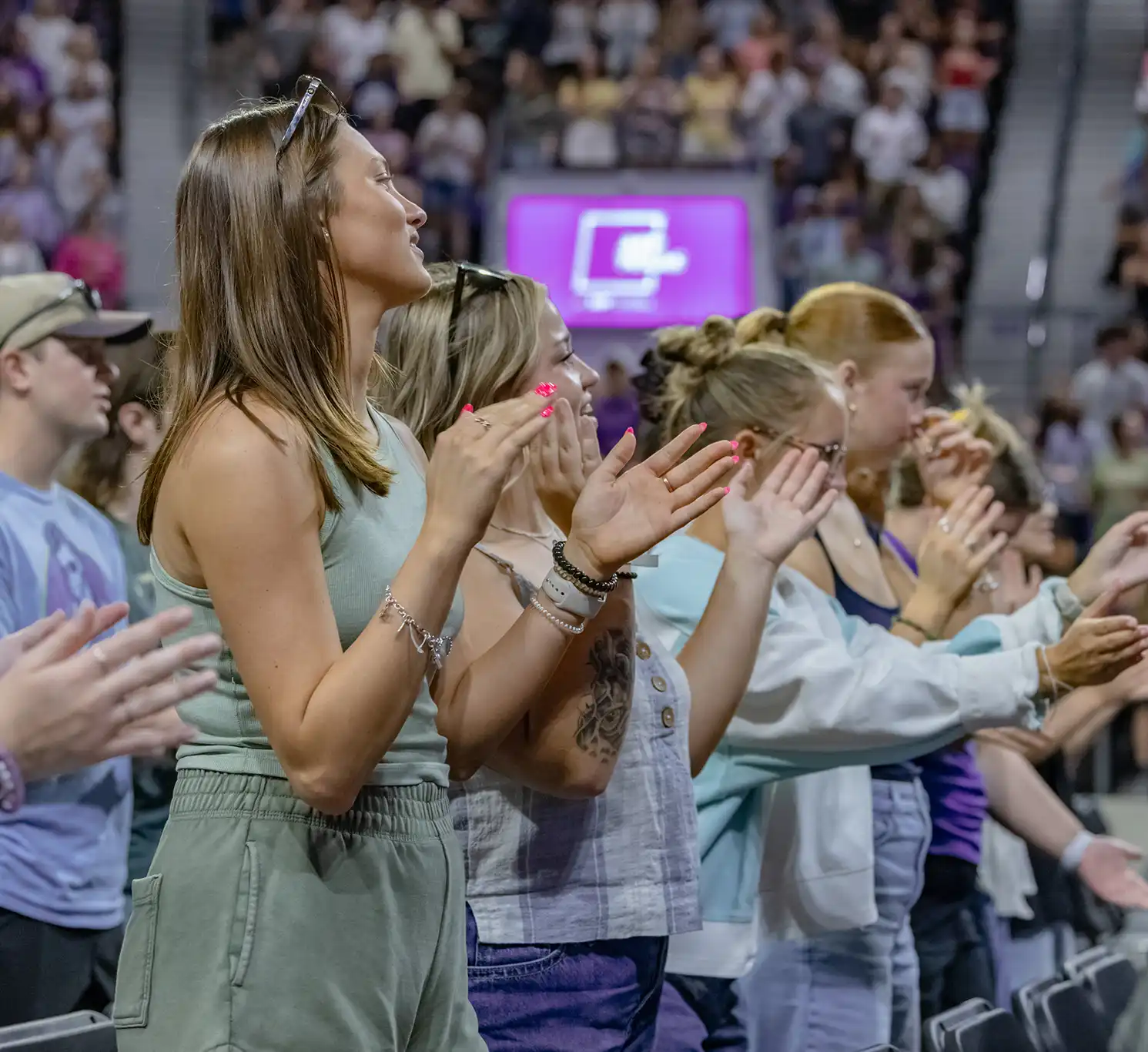Students clap and sing during a praise day Friday Chapel.
