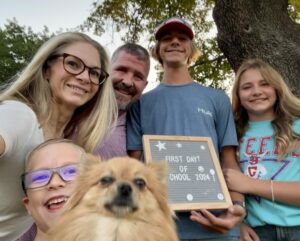 Brent Homan and family taking back to school photo. 