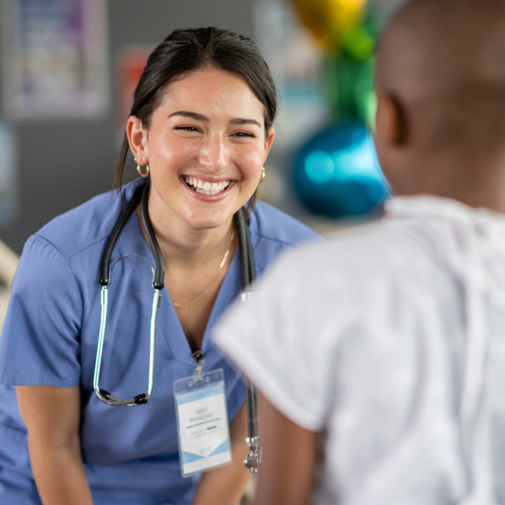 Nurse interacting with patient.