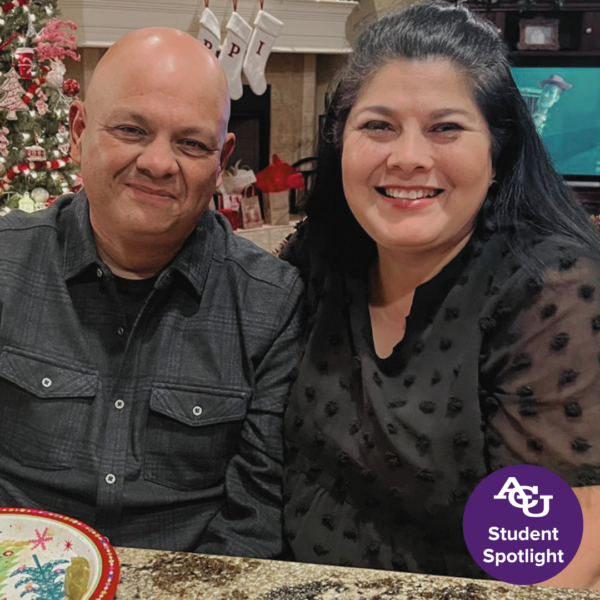 Rose Delgado smiling with husband for photo.