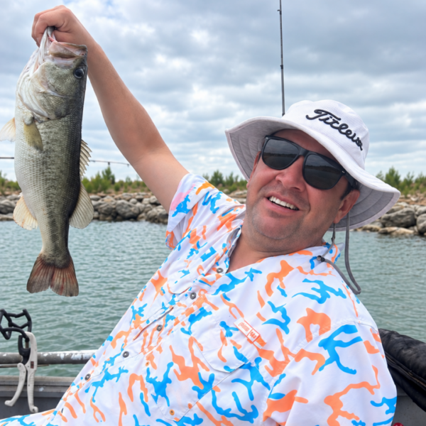 Rick Martinez posing with fish