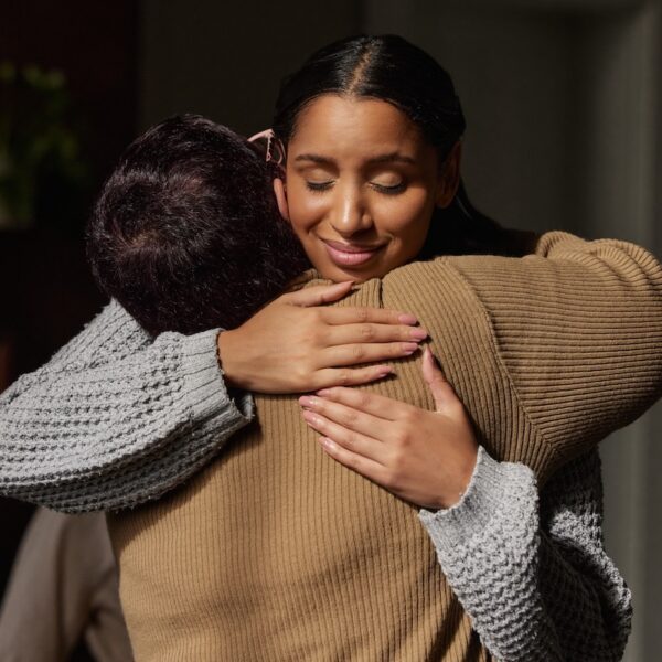 Woman hugging loved one