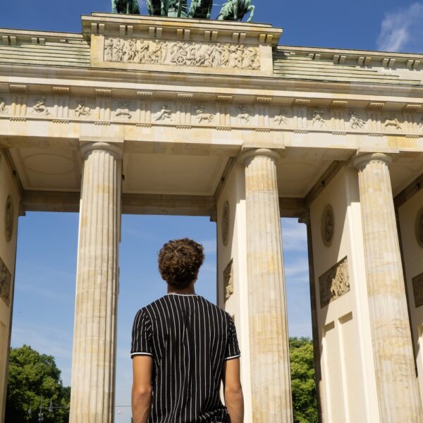 A Rising Scholar student in Germany looking at pillars.