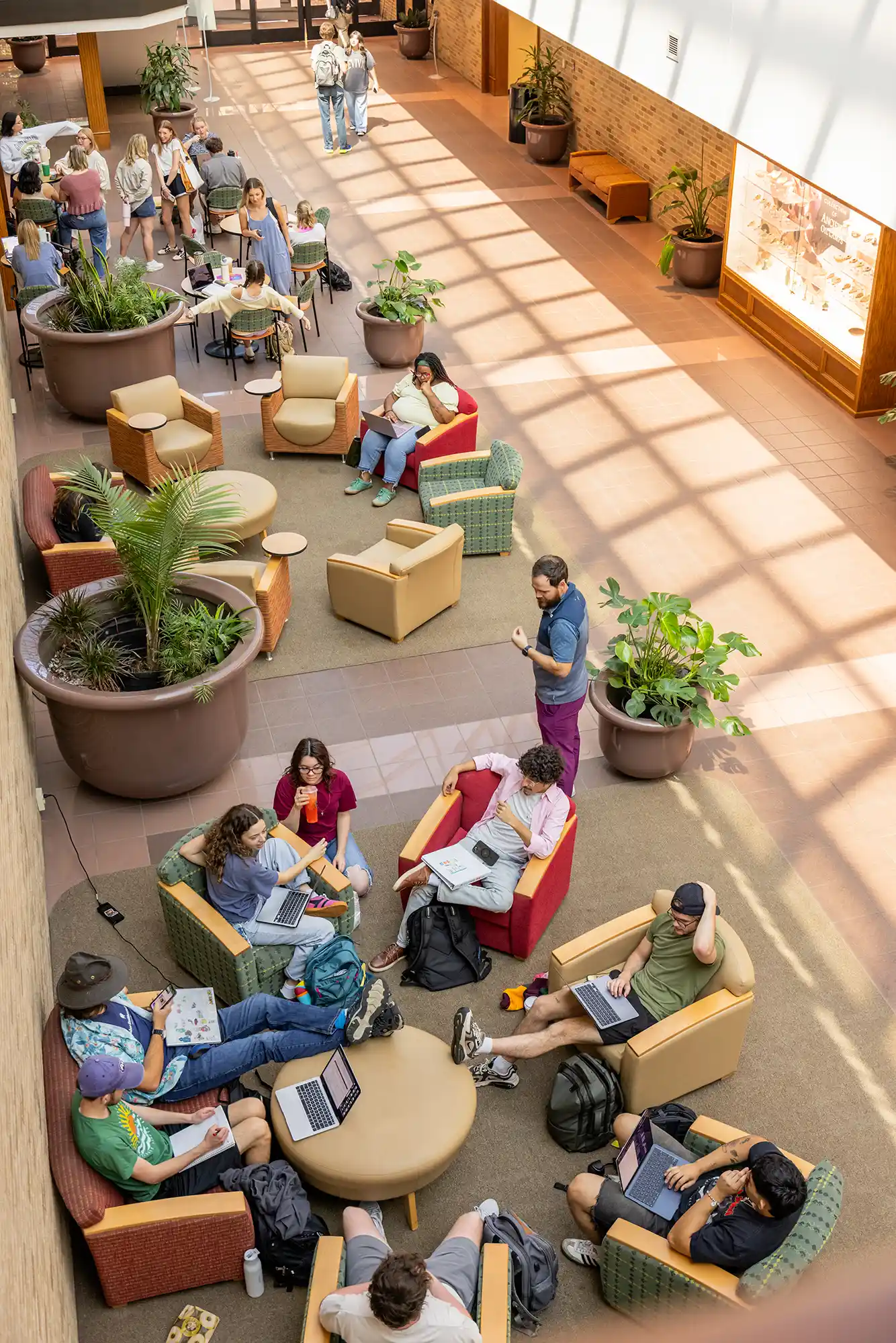 Students hang out and study in the Hall of Servants between classes.