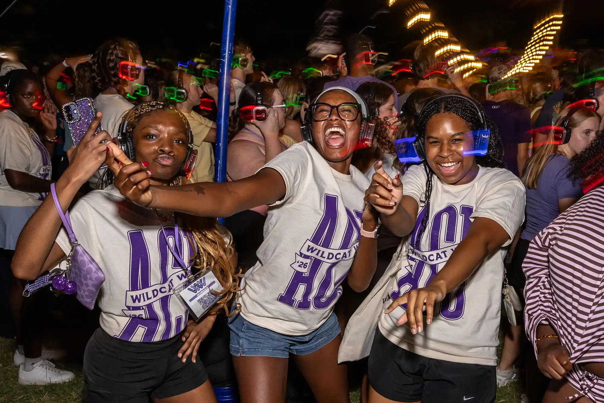 A crowd of students dancing at a silent disco during Wildcat Week.